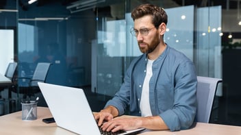 business man using his laptop