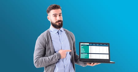 smiling guy holding laptop with SaaS Security Checklist on the screen
